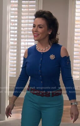 Coralee’s blue cold-shoulder cardigan on Insatiable