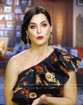 D’Andra’s black floral one shoulder top on The Real Housewives of Dallas