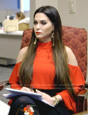 D’Andra’s red cold-shoulder top and floral boots on The Real Housewives of Dallas