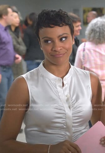 Etta Mae’s white gathered sleeveless blouse on Insatiable