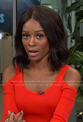 Zuri’s red cold-shoulder ribbed top on Live from E!