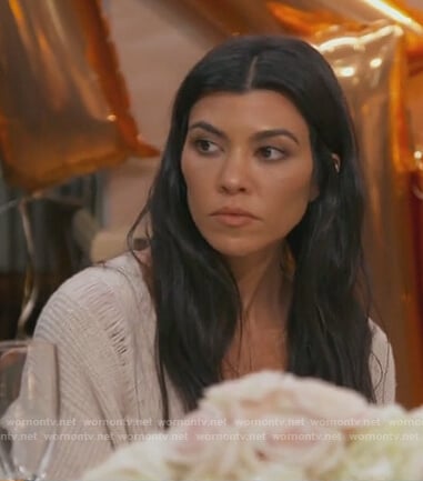 Kourtney’s beige distressed sweater on Keeping Up with the Kardashians