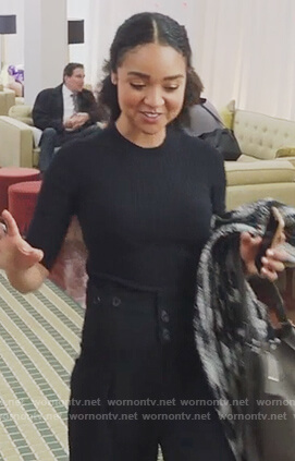 Kat’s black ribbed top and button detail pants on The Bold Type