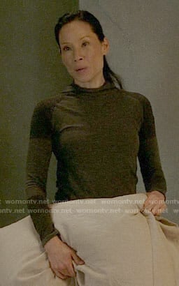 Joan’s colorblock hooded top on Elementary