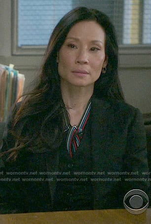 Joan’s striped tie-neck blouse on Elementary