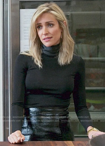 Kristin’s black leather neck top and mini skirt on Very Cavallari