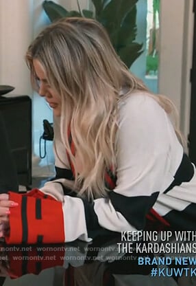 Khloe’s white striped cardigan on Keeping Up with the Kardashians
