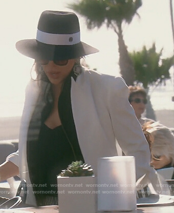 Kelly’s white tie sleeve jacket on The Real Housewives of Orange County