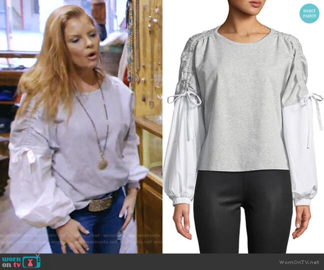1.State Drawstring Long-Sleeve Blouse worn by Brandi Redmond on The Real Housewives of Dallas