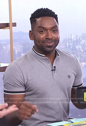 Justin’s gray polo shirt on E! News Daily Pop