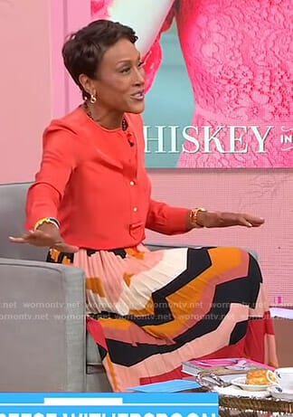 Robin’s orange shirt and pleated skirt on Good Morning America