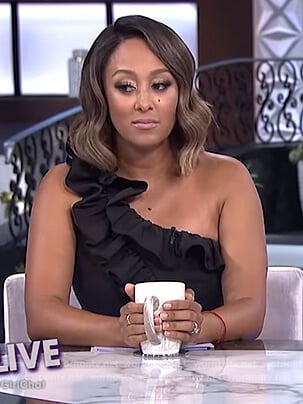 Tamera’s black one shoulder ruffle dress on The Real
