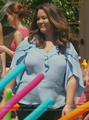 Katie’s blue ruffle v-neck blouse on American Housewife