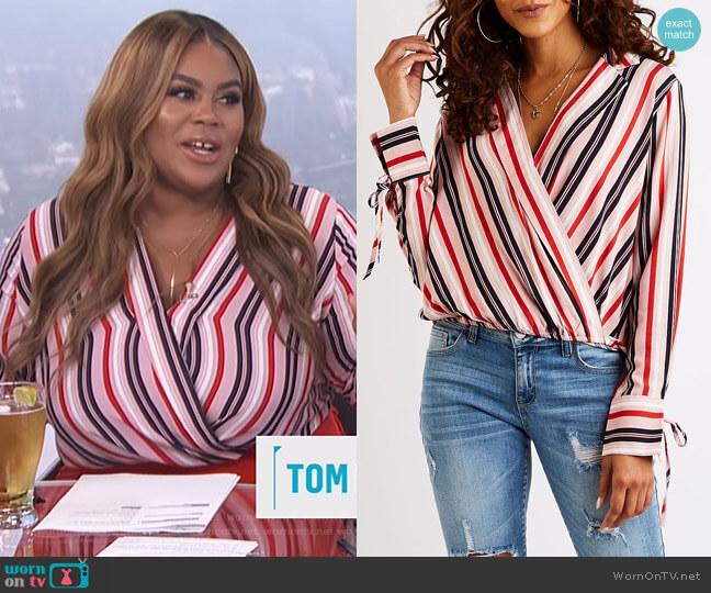 Charlotte Russe Striped Wrap Top worn by Nina Parker on E! News