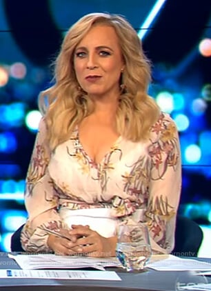 Carrie’s floral print v-neck blouse on The Project