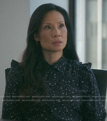 Joan’s black star and diamond print blouse on Elementary