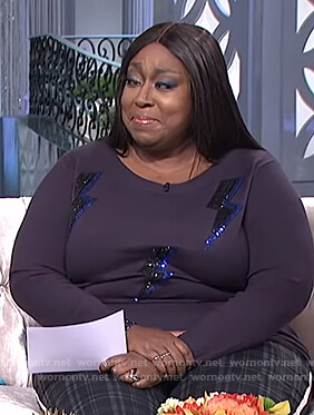 Loni’s blue lightning bolt embellished sweater on The Real