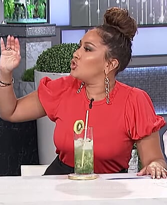 Adrienne’s red puff sleeve top on The Real