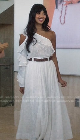 Tahani’s white eyelet one-shoulder top and maxi skirt on The Good Place