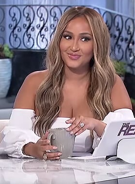 Adrienne’s white off shoulder poplin top on The Real