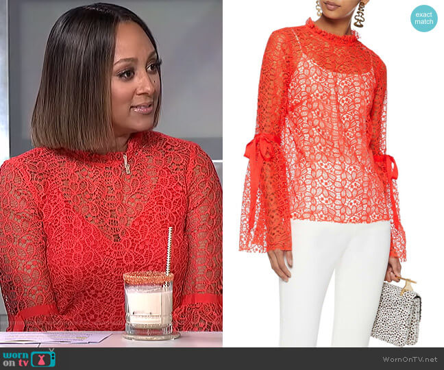 Alice McCall Just Lust bow-detailed lace blouse worn by Tamera Mowry on The Real