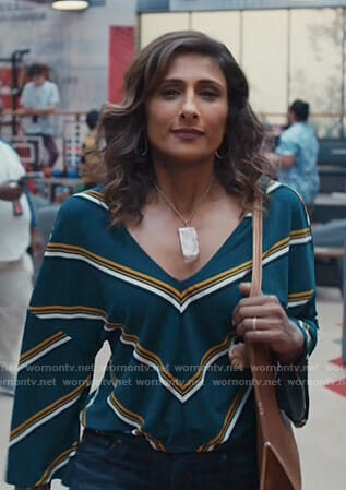 Emet’s green striped v-neck top on I Feel Bad