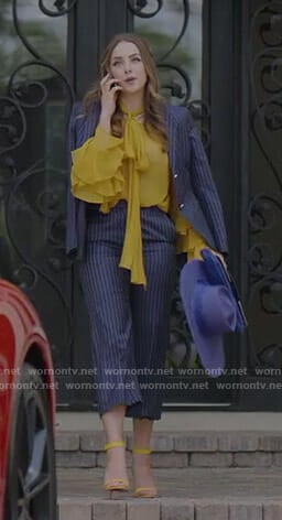 Fallon’s pinstriped suit and yellow ruffled blouse on Dynasty