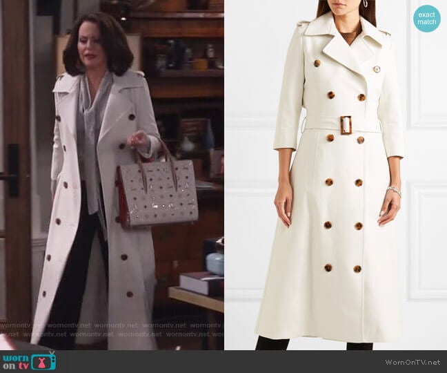 Khaite Charlotte cotton trench coat worn by Karen Walker (Megan Mullally) on Will and Grace