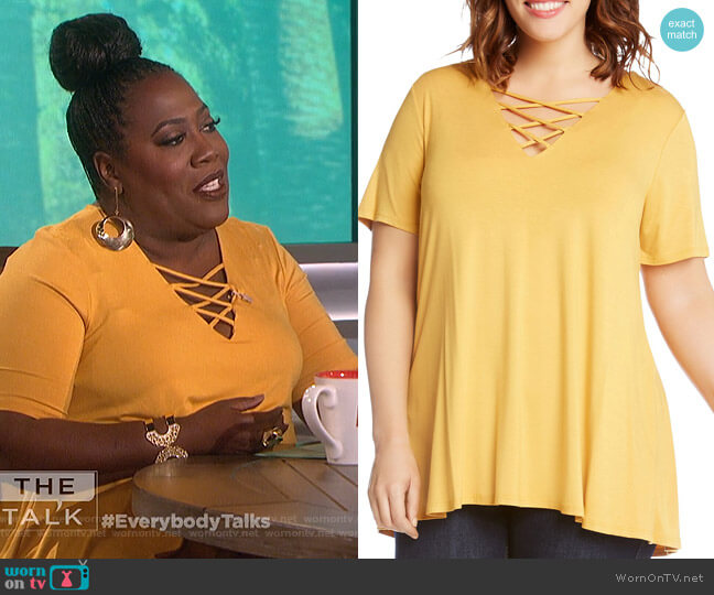 Karen Kane Plus Criss-Cross Swing Top worn by Sheryl Underwood on The Talk