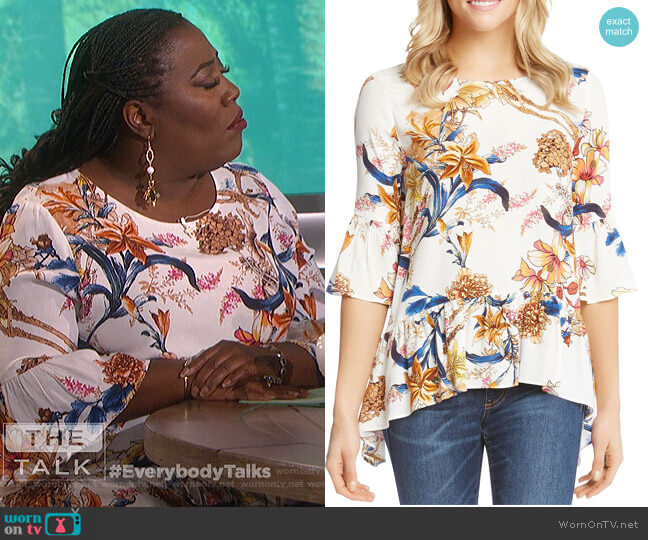 Karen Kane Floral Bell Sleeve Top worn by Sheryl Underwood on The Talk