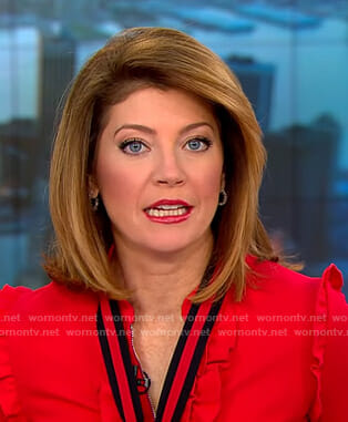 Norah’s red ruffled tie neck dress on CBS This Morning