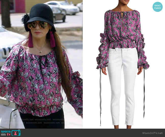 Robert Rodriguez Orchid-Print Ruffle Long-Sleeve Silk Blouse worn by D’Andra Simmons on The Real Housewives of Dallas