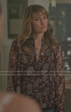 Alice’s burgundy metallic floral blouse on Riverdale