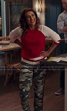 Emet’s two-tone sweater and side striped camo pants on I Feel Bad