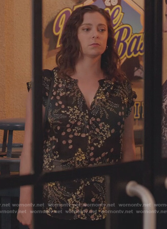 Rebecca’s black floral print top on Crazy Ex Girlfriend