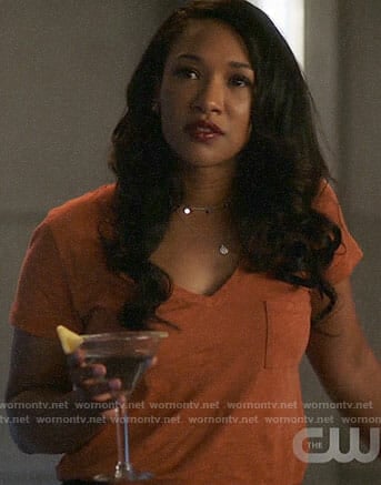 Iris’s orange v-neck tee on The Flash