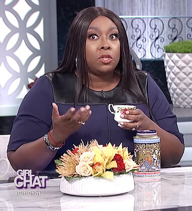 Loni’s navy dress with leather trim on The Real