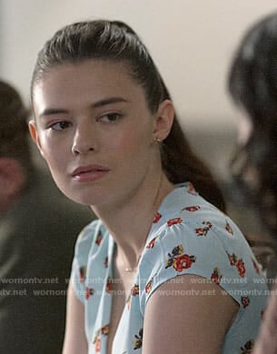 Nia’s blue rose print dress on Supergirl
