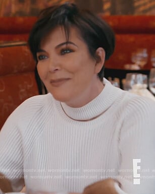 Kris’s white fur cuff sweater on Keeping Up with the Kardashians