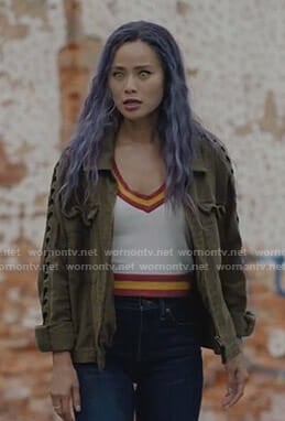 Clarice’s white varsity striped top and lace-up sleeve jacket on The Gifted