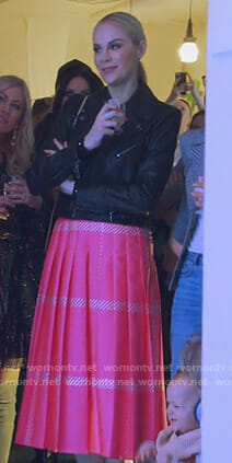 Kameron’s black moto jacket and pink pleated skirt on The Real Housewives of Dallas