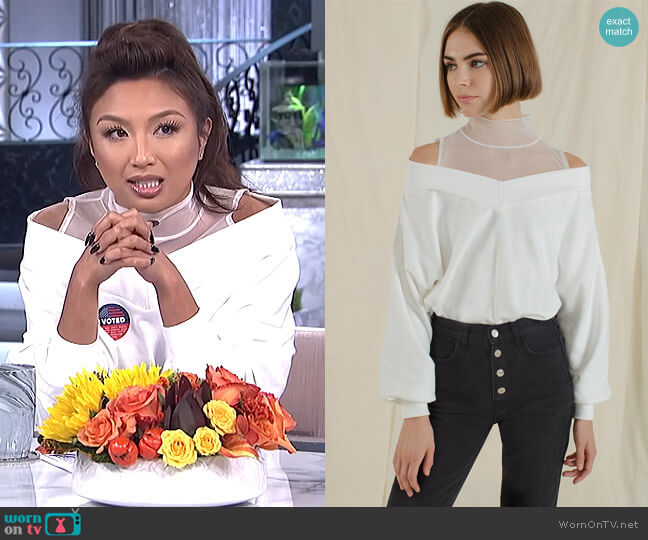 Pixie Market White Mesh Off The Shoulder Sweatshirt worn by Jeannie Mai on The Real