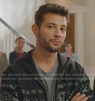 Sam’s grey paint splatter tee and eyelet zipped hoodie on Dynasty