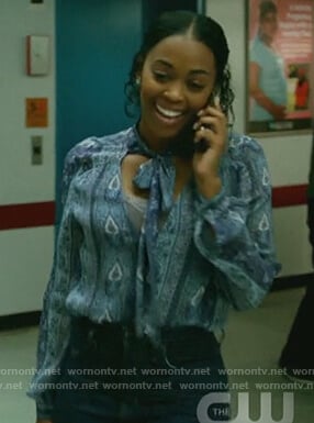 Anissa’s blue paisley print tie neck blouse on Black Lightning