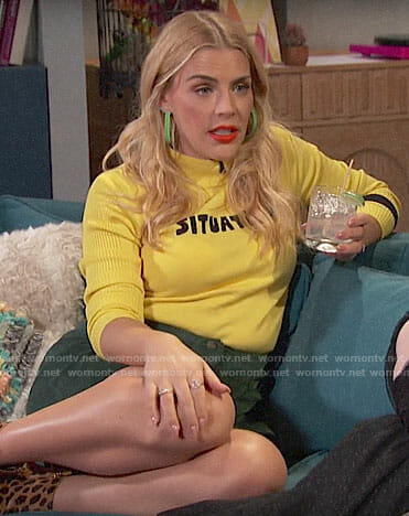 Busy’s yellow Situation sweater on Busy Tonight