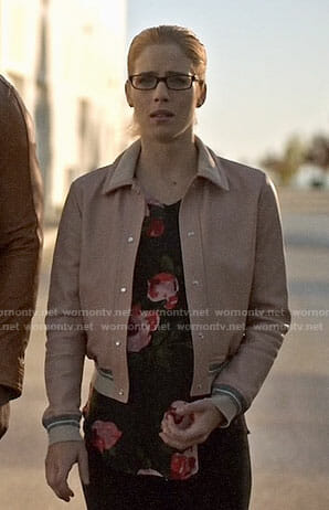Felicity’s floral top and pink bomber jacket on Arrow