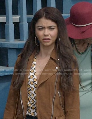 Haley’s yellow geometric print top and suede moto jacket on Modern Family