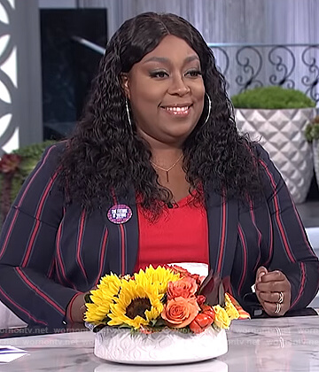 Loni’s navy striped blazer on The Real