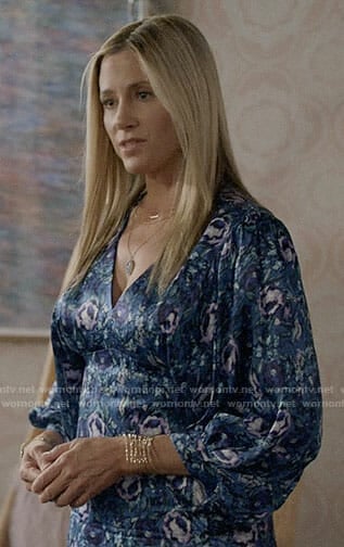 Nicole’s blue floral dress on Modern Family