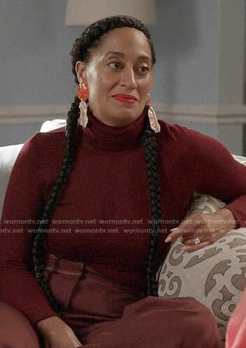 Bo’s burgundy turtleneck and orange earrings on Black-ish